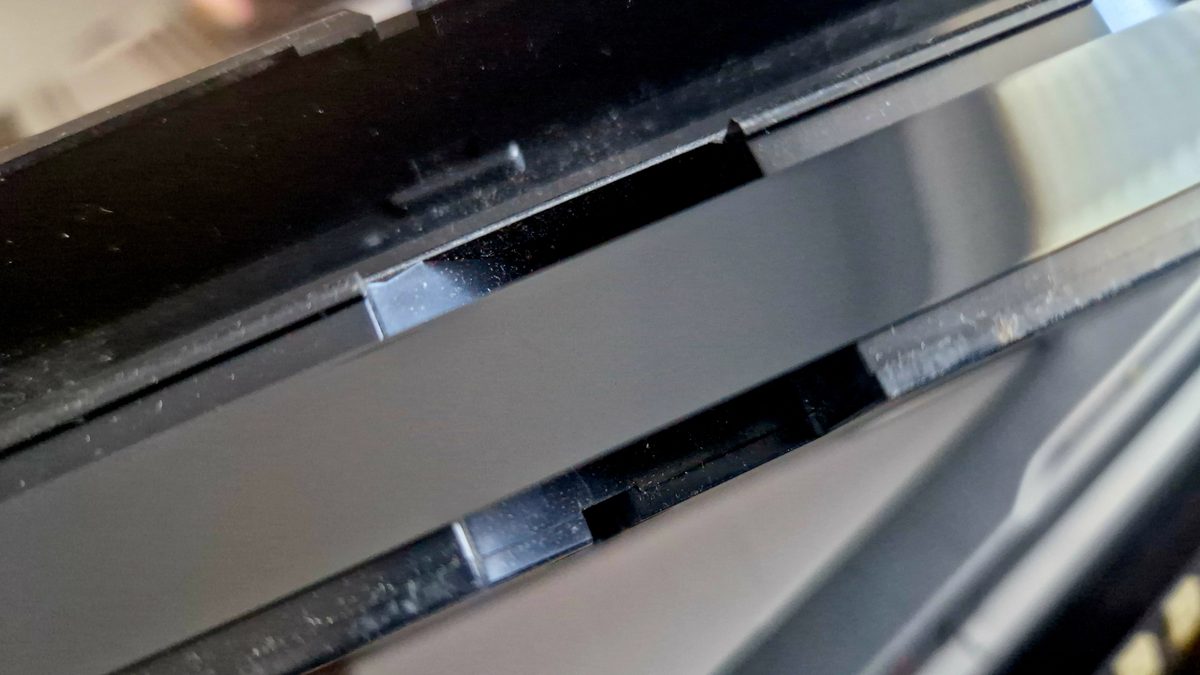 Close-up of a video tape cassette being handled